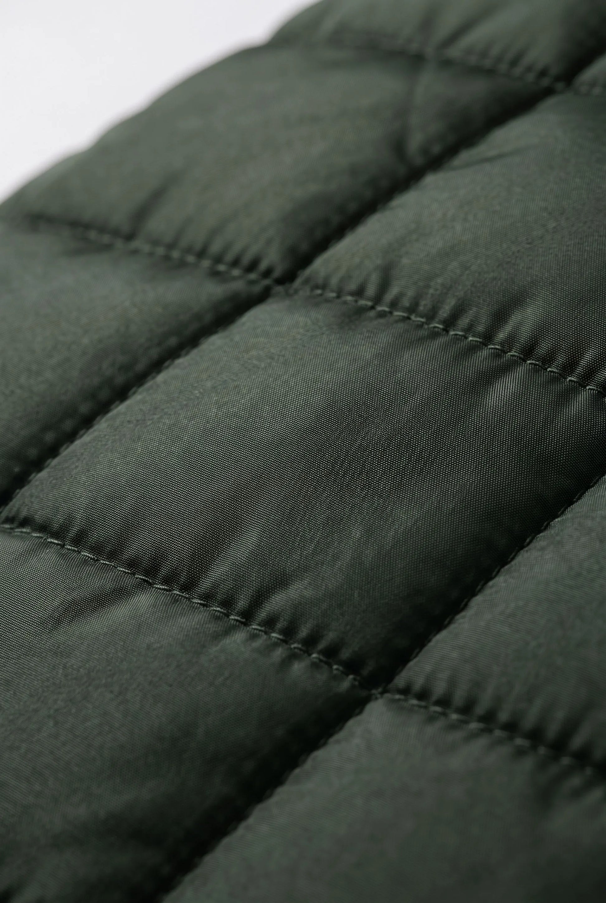 VestGlide | Lange Steppweste Mit Kapuze